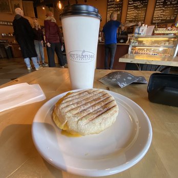 Hot Shots Java - Toffee Nut latte and a breakfast muffin sandwich. - Coffee & Tea Near Me - Poulsbo, Washington Hot Shots Java - Toffee Nut latte and a breakfast muffin sandwich. - Coffee & Tea Near Me - Poulsbo, Washington