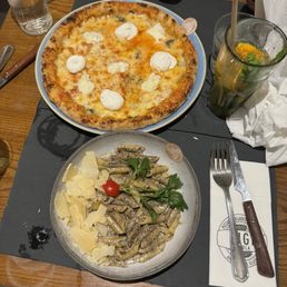 Five cheese gluten free pizza and gluten free truffle pasta... very delicious Five cheese gluten free pizza and gluten free truffle pasta... very delicious