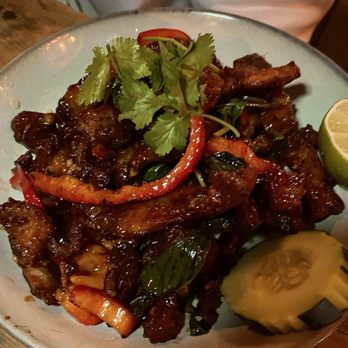 Saranrom Thai - Crispy Pork with Basil ($14.95). Fried pork belly tough like rubber. Not recommended - Thai Near Me - Elmhurst, New York Saranrom Thai - Crispy Pork with Basil ($14.95). Fried pork belly tough like rubber. Not recommended - Thai Near Me - Elmhurst, New York