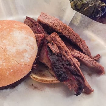 Honky Tonk BBQ - Texas brisket beef sandwich ($9.50) - slight smoke ring, sprinkled with rub, but forget the rock-hard roll - Barbeque Near Me - Chicago, Illinois Honky Tonk BBQ - Texas brisket beef sandwich ($9.50) - slight smoke ring, sprinkled with rub, but forget the rock-hard roll - Barbeque Near Me - Chicago, Illinois