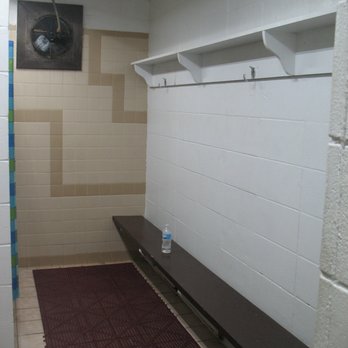 Unhitched Sleepy Hollow - Shower area - Fan ineffective - nice bench, hooks, shelving, rubber shower mat on floor - Campgrounds Near Me - Oxford, Iowa Unhitched Sleepy Hollow - Shower area - Fan ineffective - nice bench, hooks, shelving, rubber shower mat on floor - Campgrounds Near Me - Oxford, Iowa
