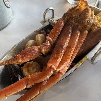 Crawfish King - A Kayak with snow crab, Black Mussels, and Headless Shrimp. - Cajun/Creole Near Me - Seattle, Washington Crawfish King - A Kayak with snow crab, Black Mussels, and Headless Shrimp. - Cajun/Creole Near Me - Seattle, Washington