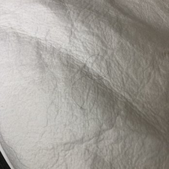 Sonesta ES Suites - Long black hair under the sheet. - Hotels Near Me - Flagstaff, Arizona