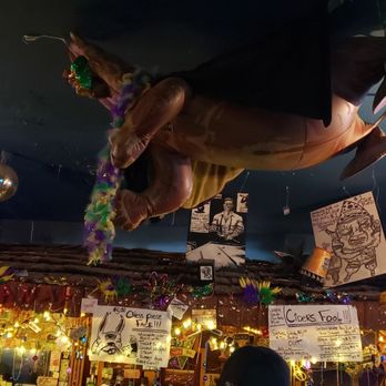 The Shanty - a man hanging from the ceiling of a bar - Bars Near Me - Eureka, California