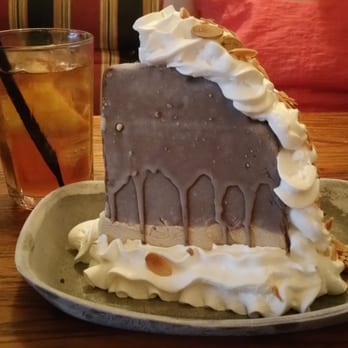 Cork 'n Cleaver - Decadent awesome Mud Pie dessert.  Ice cream and choc. cookie with chocolate shell, whipped cream, and slivered almonds. - Steakhouses Near Me - Evansville, Indiana