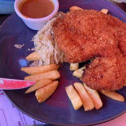 German Arms Hotel - Chicken schnitzel with chips and sauerkraut chips
