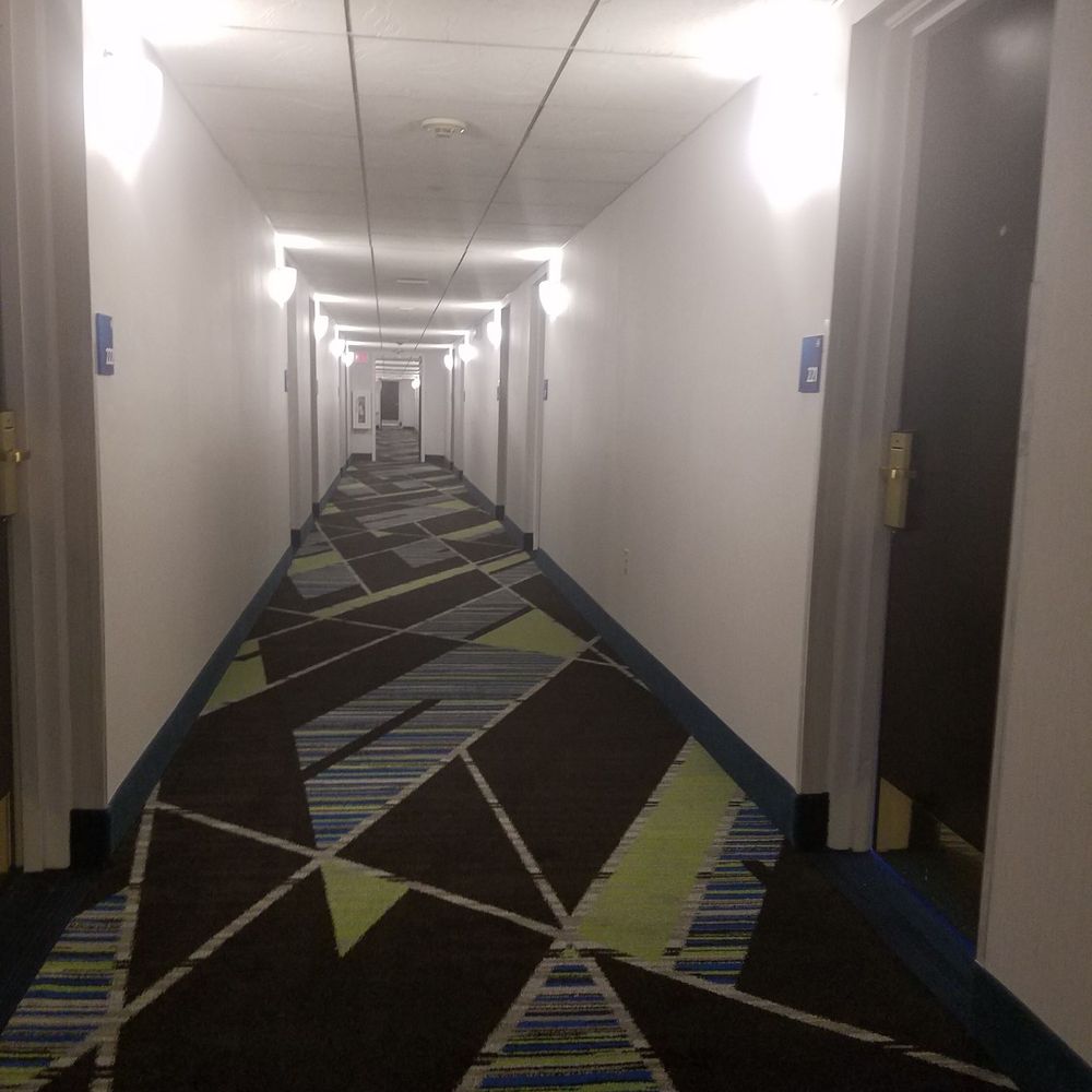 Hallway, checking out the new carpet Hallway, checking out the new carpet