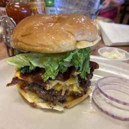 My burger. 1/3 lb. The bacon had been sticking out all around but I folded them all in to keep them in the burger. My burger. 1/3 lb. The bacon had been sticking out all around but I folded them all in to keep them in the burger.