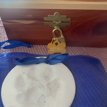 Pet Home Euthanasia Service - Paw print and urn. - Pet Cremation Services Near Me