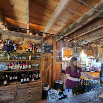 The Barns At Hamilton Station - a woman at the bar - Wineries Near Me - Hamilton, Virginia The Barns At Hamilton Station - a woman at the bar - Wineries Near Me - Hamilton, Virginia