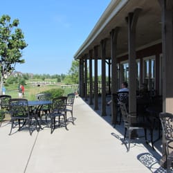 T F Boonies - Great back patio with view of golf, greenery, and pond.