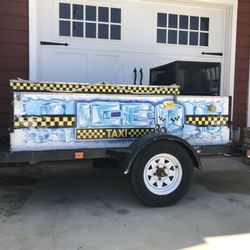 The Ice Taxi ice delivery service - This freezer trailer holds 600lbs of bagged ice.
