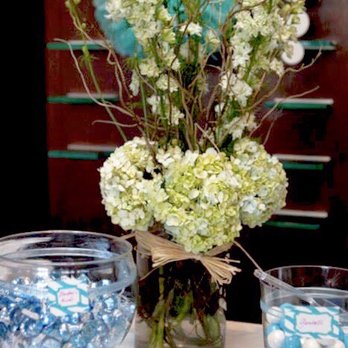 Quinn Florist - Flower arrangement for candy table - Florists Near Me - Astoria, New York Quinn Florist - Flower arrangement for candy table - Florists Near Me - Astoria, New York