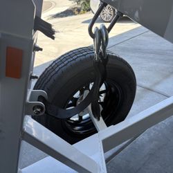 Bjornson Marine - Strapped snapped on trailer not safe being on road.