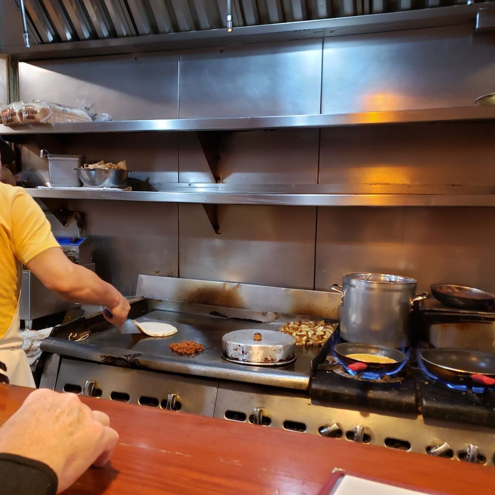 Lundy's Home Cooking - This guy is an athlete the way he moves around the grill. - Diners Near Me - San Rafael, California Lundy's Home Cooking - This guy is an athlete the way he moves around the grill. - Diners Near Me - San Rafael, California