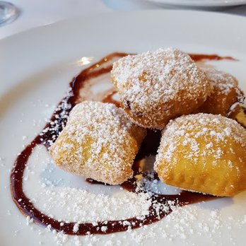 Rioja - beignets, sweet goat cheese and black mission fig filled pastries, ruby port wine reduction - New American Near Me - Denver, Colorado Rioja - beignets, sweet goat cheese and black mission fig filled pastries, ruby port wine reduction - New American Near Me - Denver, Colorado