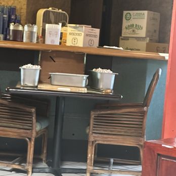 Wong's Genghis Khan - workers food prep station in front of bar , where people pass by freely. you can see chopped veggies not covered and chopping board exposed - Chinese Near Me - Reno, Nevada