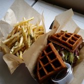 Photo of CreativEats - Hawthorne, CA, United States. Pulled pork waffle sandwich and order or garlic fries