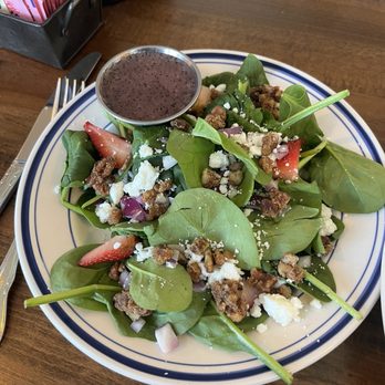 Isla's Kitchen - STRAWBERRY POPPYSEED SALAD spinach, strawberries, red onion, goat cheese, praline pecans,  sweet Side Poppyseed Dressing - Southern Near Me - Tulsa, Oklahoma
