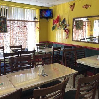 Caribbean Crown - Very reminiscent of the restaurants in the islands. Small but quaint and VERY popular in the neighborhood. #IslandTrendy - Caribbean Near Me - Tampa, Florida