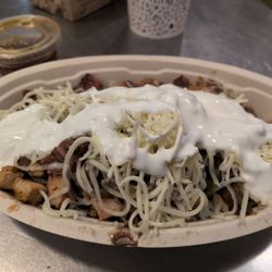 A custom bowl with a side of chimichurri