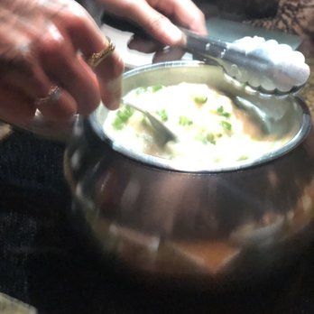 The Melting Pot - Preparing the fabulous Wisconsin Cheese - Fondue Near Me - Boca Raton, Florida The Melting Pot - Preparing the fabulous Wisconsin Cheese - Fondue Near Me - Boca Raton, Florida