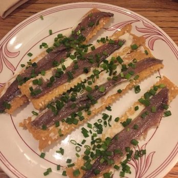 Gocciolina - Anchovies on sesame crackers. Large salt crystals make this pop in your mouth, pairs well with a light and dry cocktail. - Italian Near Me - Durham, North Carolina Gocciolina - Anchovies on sesame crackers. Large salt crystals make this pop in your mouth, pairs well with a light and dry cocktail. - Italian Near Me - Durham, North Carolina