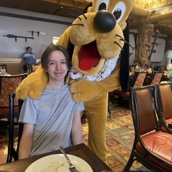 My Happy Place Destinations - Character breakfast with Pluto! - Travel Agents Near Me