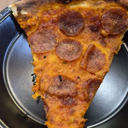 Does this not look like a slice that is a week old.   It was absolutely horrible.    We will try a fresh pizza someday and hope it's good.