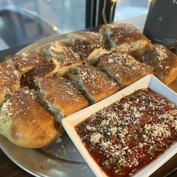 The Growler Exchange - Garlic bread and marinara sauce - Beer Bar Near Me - San Antonio, Texas The Growler Exchange - Garlic bread and marinara sauce - Beer Bar Near Me - San Antonio, Texas