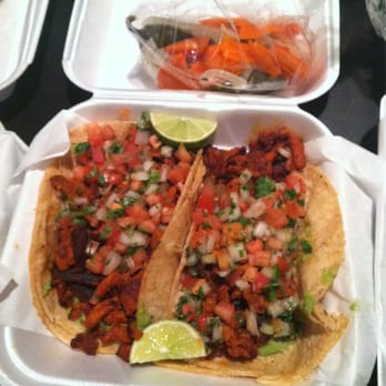 Cali Tacos - Adobado tacos. Guac on the bottom, meat and Pico. Two tortillas. - Mexican Near Me - Orange, California