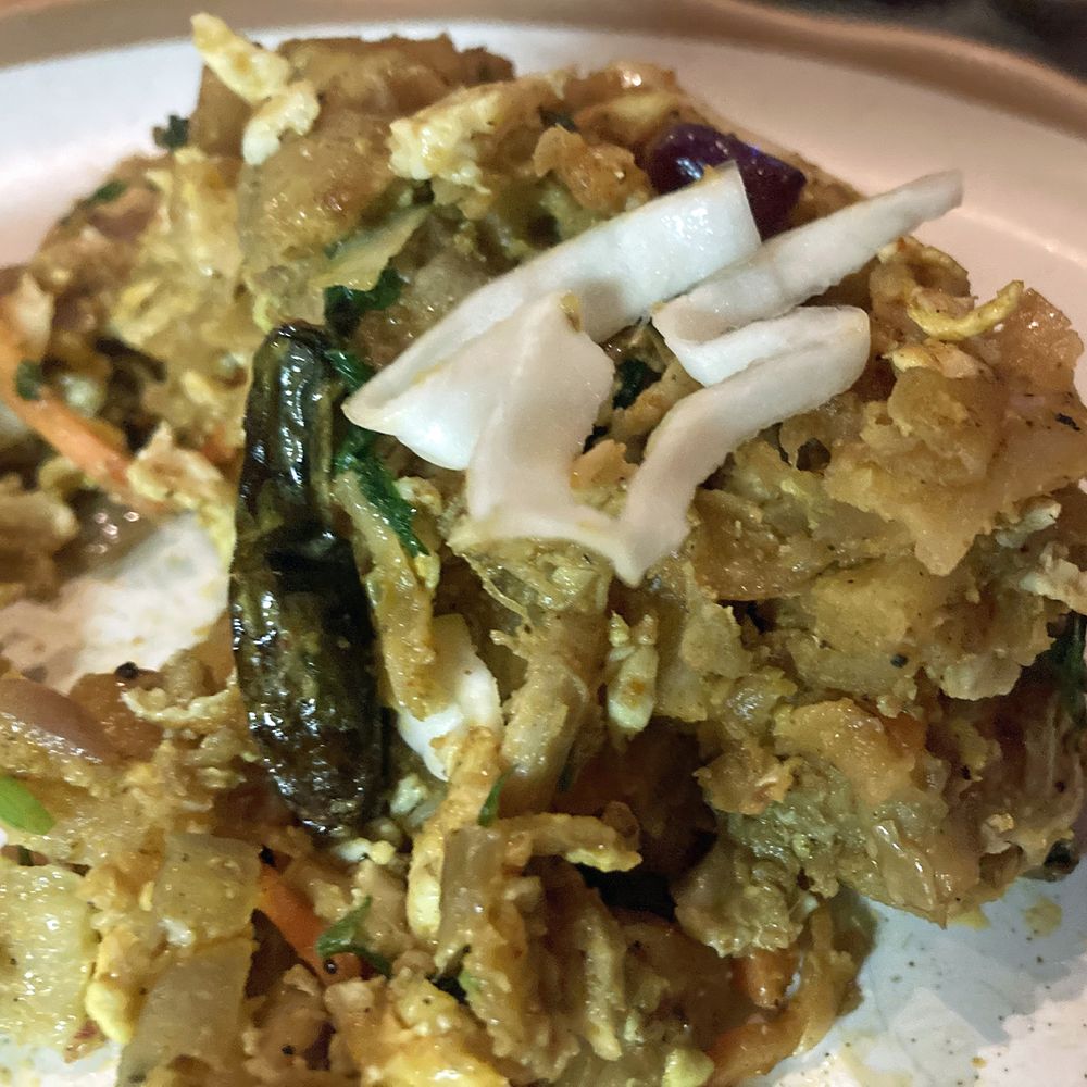 Lungi - Chicken Kothu Roti - the texture reminded me of Thanksgiving stuffing. I loved it! - Cocktail Bars Near Me - New York, New York Lungi - Chicken Kothu Roti - the texture reminded me of Thanksgiving stuffing. I loved it! - Cocktail Bars Near Me - New York, New York