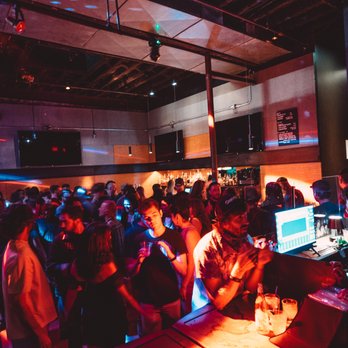Middlesex Cambridge - a crowd of people at a nightclub - Steakhouses Near Me - Cambridge, Massachusetts