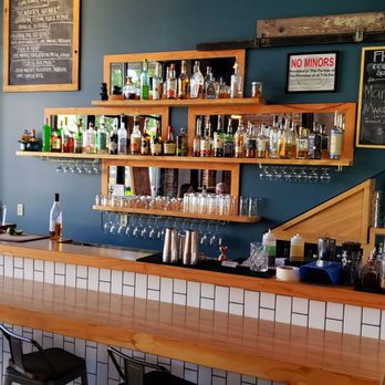 The Haul - a bar with a lot of bottles of alcohol - New American Near Me - Grants Pass, Oregon