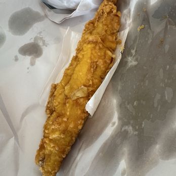 Ken's Fish Bar - Another picture of the huge piece of fish. We easily could've ordered one and split it in half. - Fish & Chips Near Me - London, XGL Ken's Fish Bar - Another picture of the huge piece of fish. We easily could've ordered one and split it in half. - Fish & Chips Near Me - London, XGL