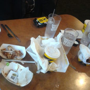 Buffalo Wild Wings - Our table, piled high with trash because nobody ever came to clear it or refill our drinks. Not even once. - Chicken Wings Near Me - Tacoma, Washington Buffalo Wild Wings - Our table, piled high with trash because nobody ever came to clear it or refill our drinks. Not even once. - Chicken Wings Near Me - Tacoma, Washington