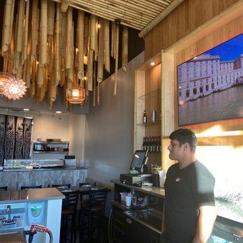 Masa Sushi & Eastern Cuisine - Hathan hanging out by the bar ready for you to come on in! - Sushi Bars Near Me - Wilmington, North Carolina Masa Sushi & Eastern Cuisine - Hathan hanging out by the bar ready for you to come on in! - Sushi Bars Near Me - Wilmington, North Carolina