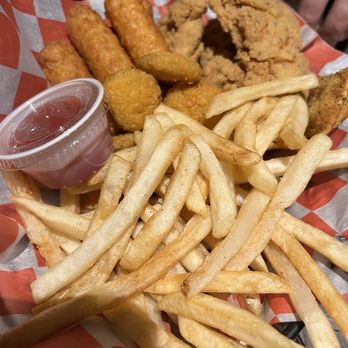 Helium Comedy Club - Sampler basket: fries, chicken strips, mozzarella sticks, fried pickles, toasted rav - Comedy Clubs Near Me - Saint Louis, Missouri