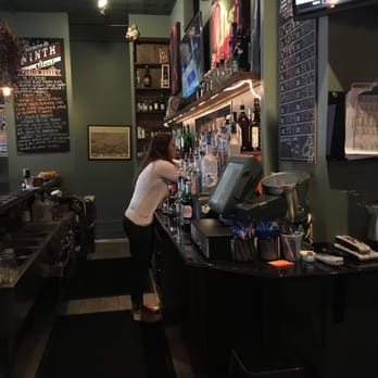 9th Street Public House - a bartender at the bar - Pubs Near Me - Columbia, Missouri 9th Street Public House - a bartender at the bar - Pubs Near Me - Columbia, Missouri
