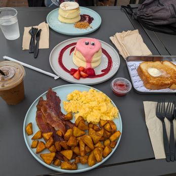 Burnt Crumbs - Vietnamese Ice Coffee, 2 egg breakfast with Texas toast, Strawberry and Berry Souffle Pancakes. Delicious! - New American Near Me - Irvine, California