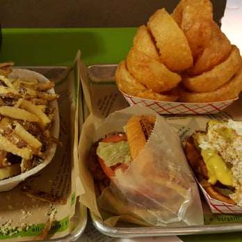 BurgerFi - Burgerfi Burger, Breakfast All Day burger, large parmesan herb fries and onion rings. - Burgers Near Me - Davie, Florida BurgerFi - Burgerfi Burger, Breakfast All Day burger, large parmesan herb fries and onion rings. - Burgers Near Me - Davie, Florida