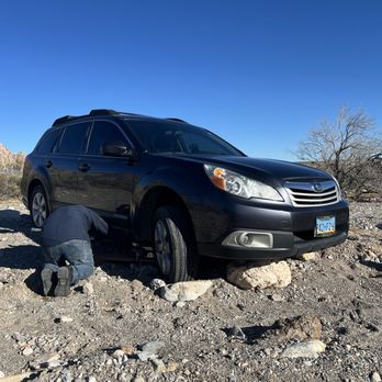 G&R Towing Services - Rudy Lifting the car up with a jack! - Towing Near Me - Las Vegas, Nevada G&R Towing Services - Rudy Lifting the car up with a jack! - Towing Near Me - Las Vegas, Nevada