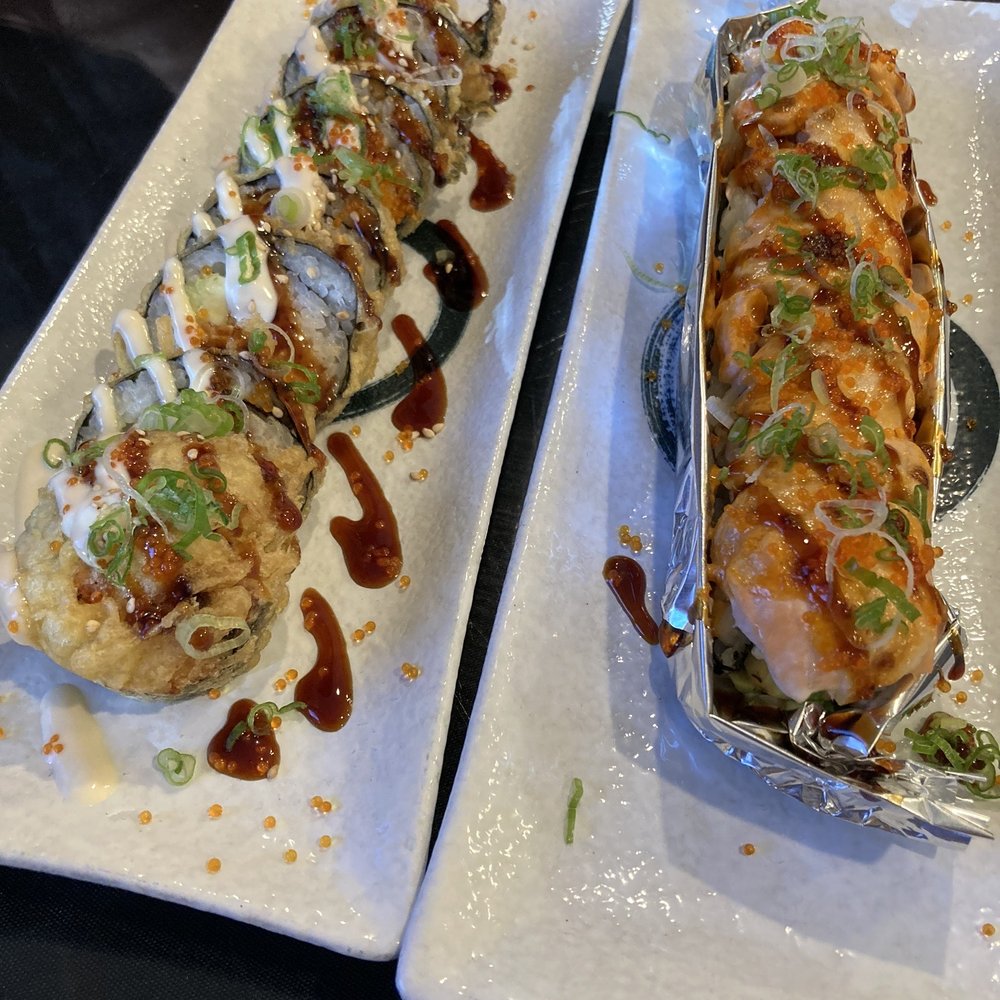 Bashamichi Sushi and Bar - Left: dynamite roll; Right: lion king roll - Japanese Near Me - Millbrae, California Bashamichi Sushi and Bar - Left: dynamite roll; Right: lion king roll - Japanese Near Me - Millbrae, California