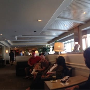 Admirals Club - Narrow. Windows to right look out on tarmac. - Airport Lounges Near Me - Phoenix, Arizona