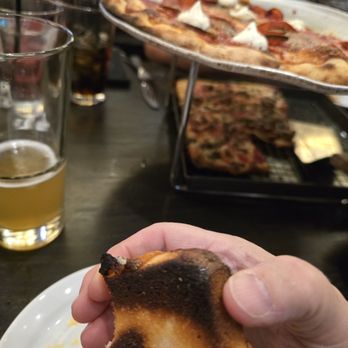 Pizza Rock - Bottom of one of our pizzas, the other pizza the crust and bottom looked same, burnt. - Pizza Near Me - Henderson, Nevada Pizza Rock - Bottom of one of our pizzas, the other pizza the crust and bottom looked same, burnt. - Pizza Near Me - Henderson, Nevada