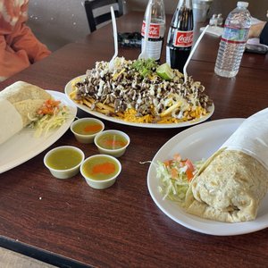 Photo of Chüyz Taco Shop - San Diego, CA, United States. Carne asada fries + 2 Cali burritos