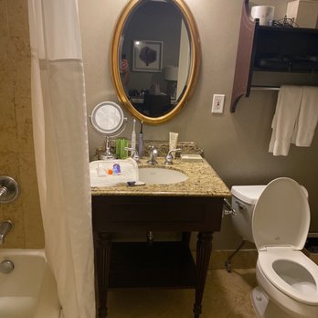 Hotel del Coronado, Curio Collection by Hilton - Super small bathroom with a single mirror in the whole room. - Coronado, CA