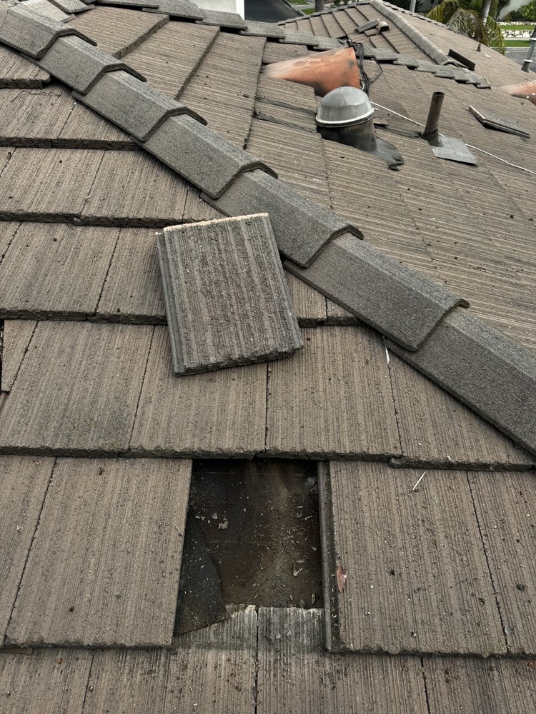 Slide of Coby Roof Repair