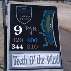 Links O'Tryon - Tee marker at the 9th. Level with a slight dogleg. Big slicers could end up OB on the road.