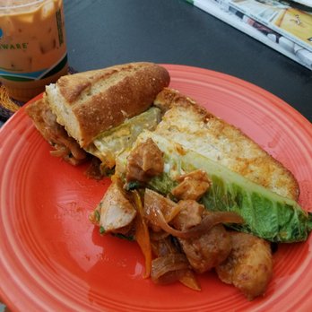 Pink Bee - Panang Curry Chicken Sandwich and Thai Iced Tea - Sandwiches Near Me - Seattle, Washington Pink Bee - Panang Curry Chicken Sandwich and Thai Iced Tea - Sandwiches Near Me - Seattle, Washington